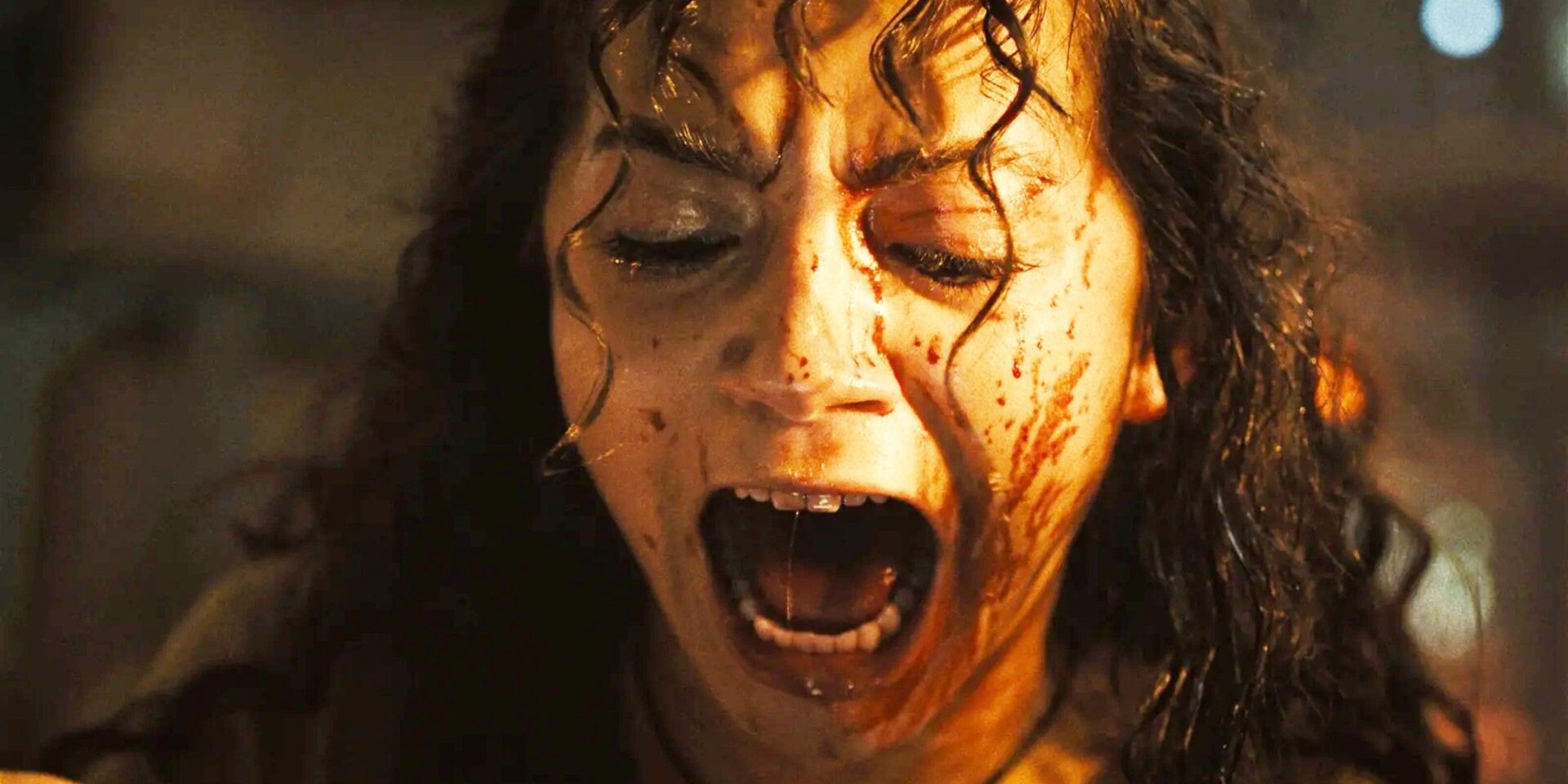 Kay (Isabela Merced) screaming with blood in her face in Alien: Romulus